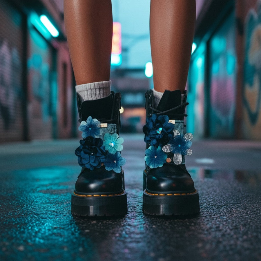 Dr.Martens black shoe styled with LŪPZ Fig shoe accessories, shown on a model walking through a neon-lit urban alley.