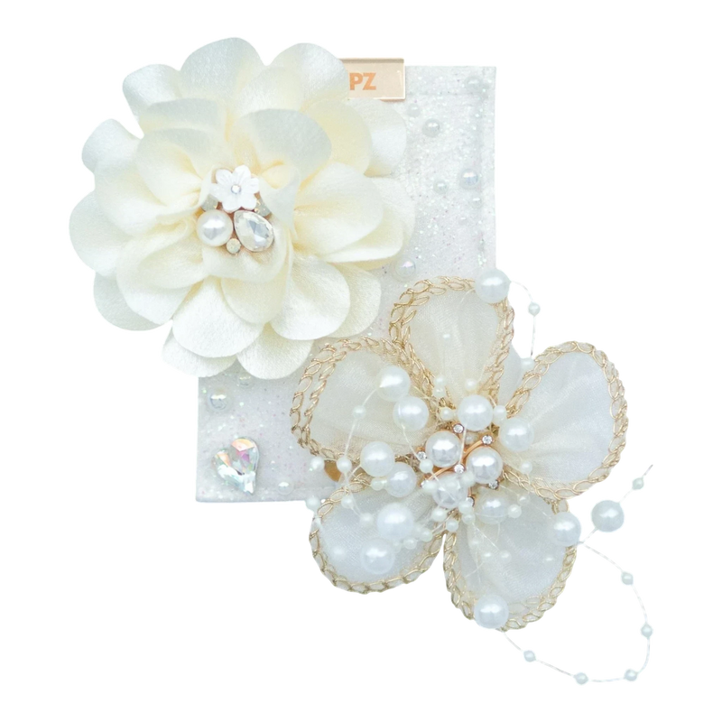 LŪPZ Champagne hair clip with cream fabric flowers, pearls, and rhinestones. Perfect for celebrations.